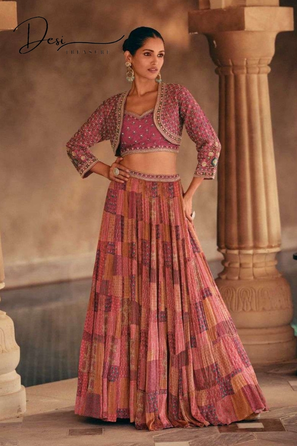 Elevate your ethnic wardrobe with our stunning "Embroidery Lehenga Choli with Shrug." Top Fabric: Premium Silk with Intricate Embroidery Bottom Fabric: Premium Silk with Can Can Work: Front and Back Embroidery Type: Fully Stitched Indulge in the allure of this ensemble, where every detail tells a story of craftsmanship and elegance. The Premium Silk top adorned with meticulous embroidery work on both the front and back sets a regal tone. Paired with a matching Premium Silk bottom featuring Can Can for added flair, this outfit is a perfect blend of tradition and contemporary style. The fully stitched design ensures a hassle-free and stunning look. Embrace timeless beauty with our Embroidery Lehenga Choli with Shrug, a true celebration of grace and sophistication.